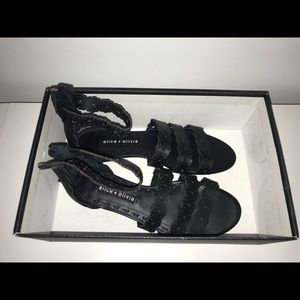 Size 6.5 never worn Alice and Olivia black sandals